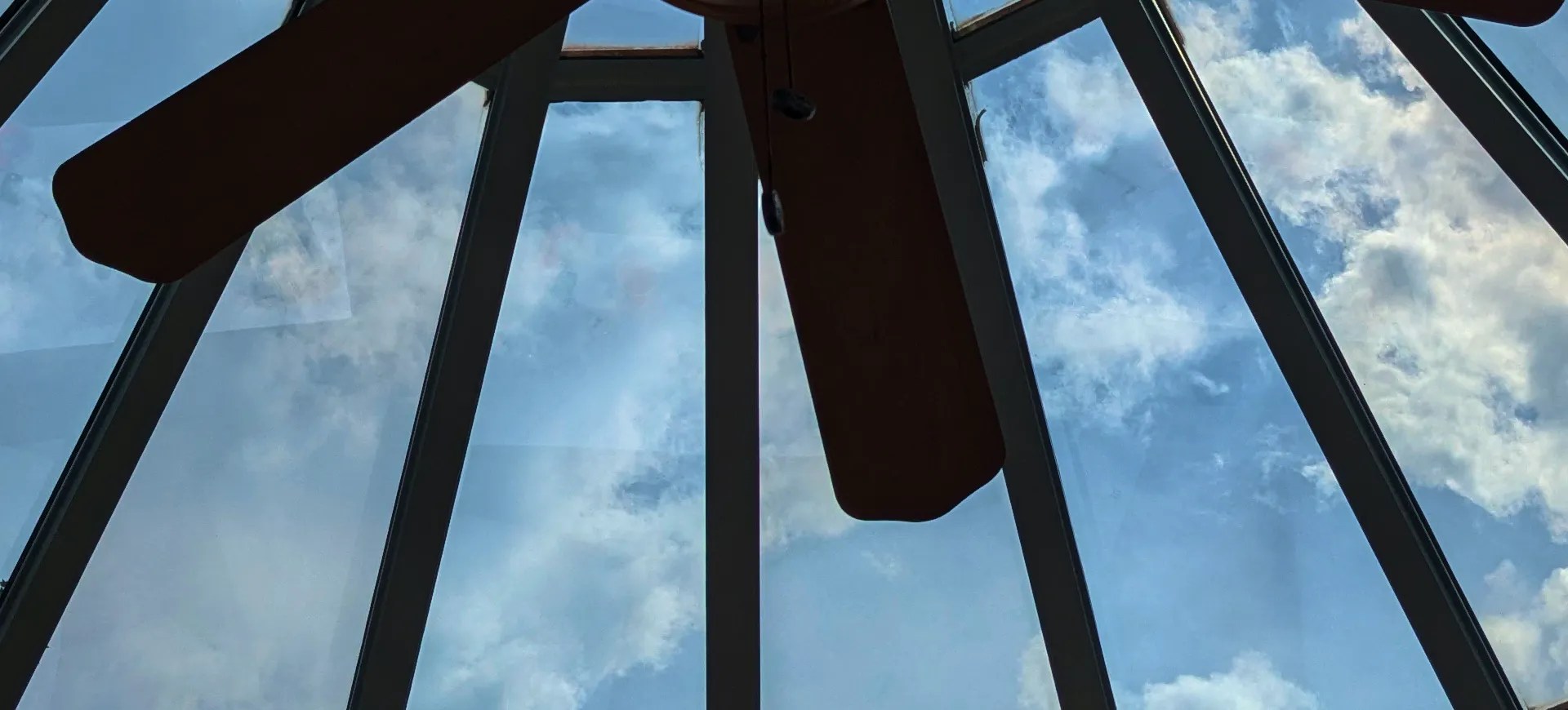 Crystal-clear windows — a sky-lit glass ceiling